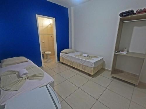 Katil atau katil-katil dalam bilik di Hotel Mão de Fatima