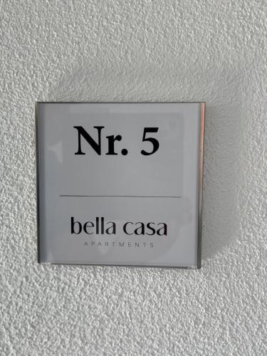 a clock on a wall with the number on it at bella casa Allgäu Apartment 5 in Bad Wörishofen