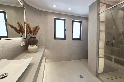 Ένα μπάνιο στο Ortus Luxury Residence