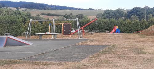 a group of playground equipment in a park at Gasthof zum Österntor in Medebach