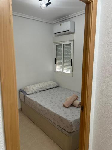Postel nebo postele na pokoji v ubytování Al borde del mar