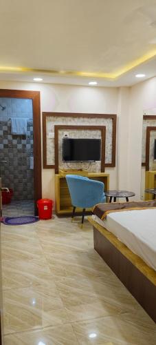 Ένα ή περισσότερα κρεβάτια σε δωμάτιο στο Hotel Imperial Inn