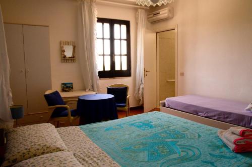 Postel nebo postele na pokoji v ubytování Belvedere Sul Mare