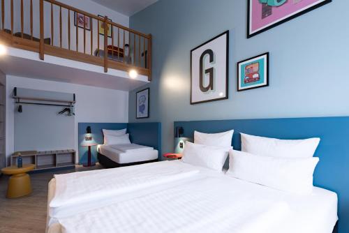 Letto o letti in una camera di Garner Hotel Kiel - Akademie