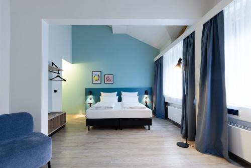 Letto o letti in una camera di Garner Hotel Kiel - Akademie