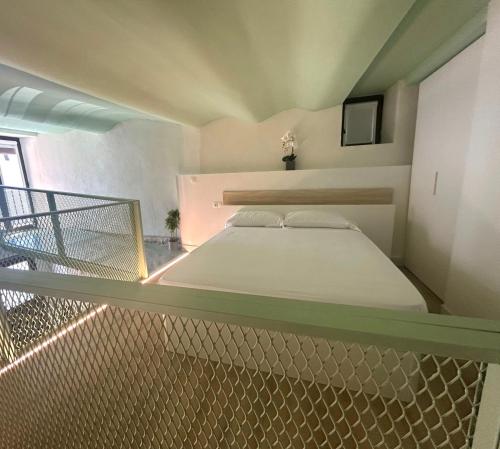 Giường trong phòng chung tại Treixadura Harbor's Light