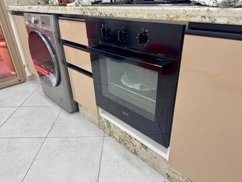 Kuchyň nebo kuchyňský kout v ubytování Hideaway Rosa Parc Mohammedia