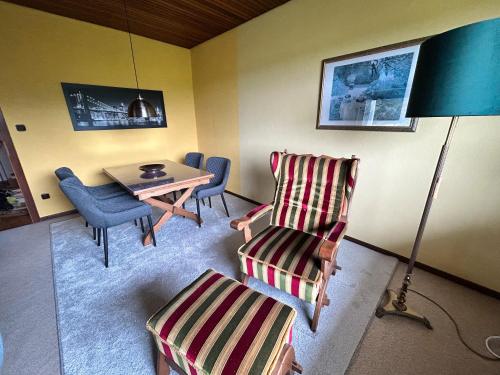 Posezení v ubytování Ferienwohnung Im Lohbusch