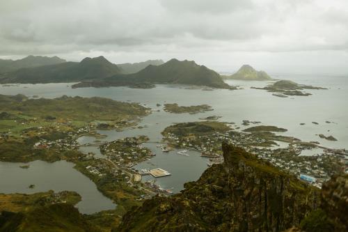 an aerial view of an island in a body of water at #Lofoten Leilighet ved sjøen in Ballstad