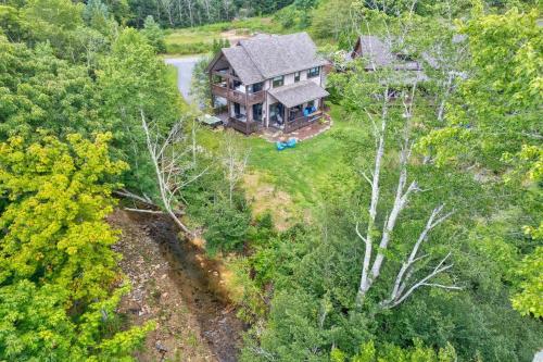 an overhead view of a large house on a hill at Maynard Rocks IV at Elk Creek in Banner Elk