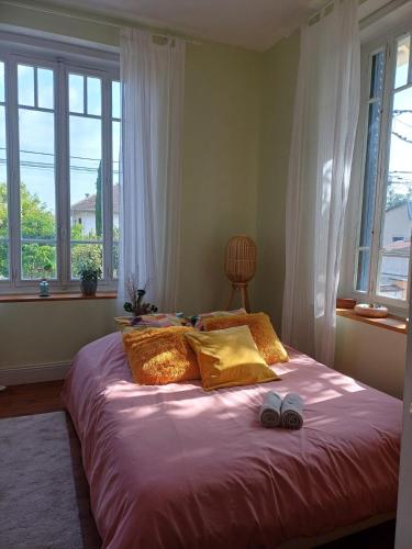 Vuode tai vuoteita majoituspaikassa Maison cocooning Année 30