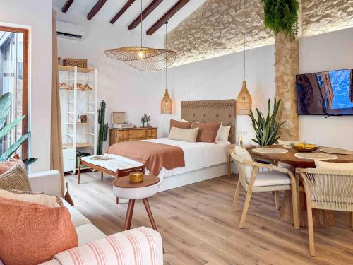 Ένα ή περισσότερα κρεβάτια σε δωμάτιο στο Casa La Calma Historia y relax cerca del centro