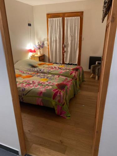 Postel nebo postele na pokoji v ubytování Le Petit Cœur