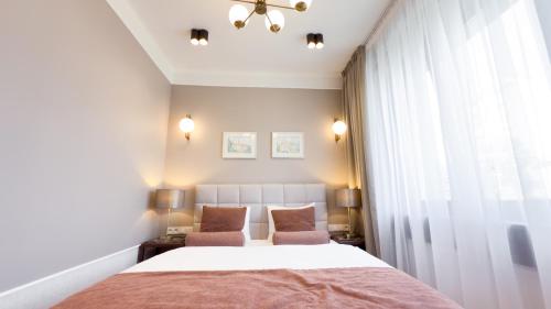 Ένα ή περισσότερα κρεβάτια σε δωμάτιο στο Avanti Villa