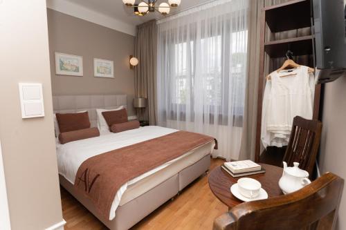 Ένα ή περισσότερα κρεβάτια σε δωμάτιο στο Avanti Villa