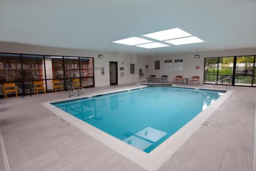 a large swimming pool in a building at Hampton Inn Salt Lake City-North in Woods Cross