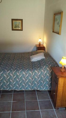 Postel nebo postele na pokoji v ubytování Agriturismo Casapasserini