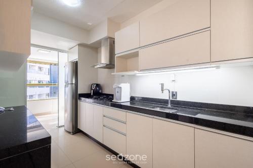 Dapur atau dapur kecil di Lindo Apto em Prédio c/ Piscina MPB0034