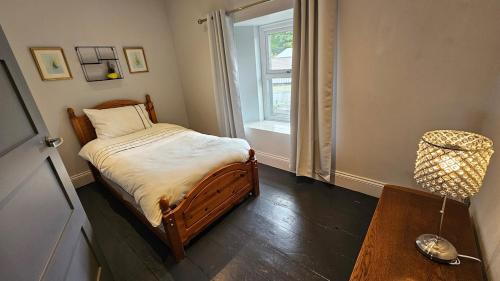 Letto o letti in una camera di Ffoswen Pembrokeshire Holiday Home