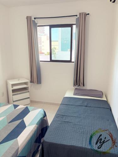 Ένα ή περισσότερα κρεβάτια σε δωμάτιο στο Ilhas de Creta 302