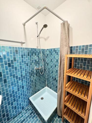 Bilik mandi di Villa pieds dans l’eau Vue mer panoramique