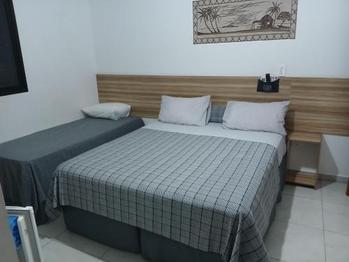 Gallery image of Pousada Parque Suites - Estacionamento e Piscina in Guarujá