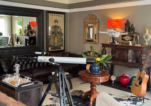 Zona de estar de The Flamingo Suite at Frederick's Place