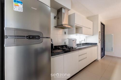 Dapur atau dapur kecil di Lindo Apto em Prédio c/ Piscina MPB0034