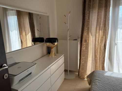 Ένα ή περισσότερα κρεβάτια σε δωμάτιο στο Urban Gaia Apartment
