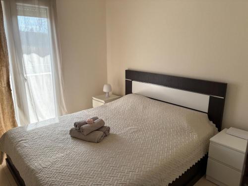 Ένα ή περισσότερα κρεβάτια σε δωμάτιο στο Urban Gaia Apartment