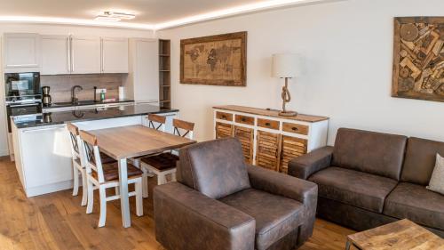 Kuchyň nebo kuchyňský kout v ubytování Dünenblick Premium-Apartments