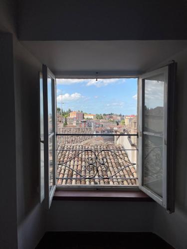 a window with a view of a city at Il rifugio di Elpidio in SantʼElpidio a Mare