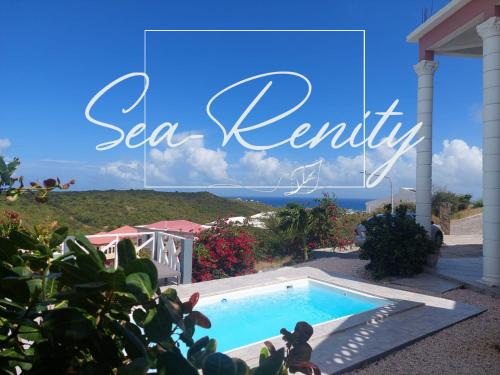 Una vista de una piscina con el texto sea karine en Sea-Renity, en Philipsburg