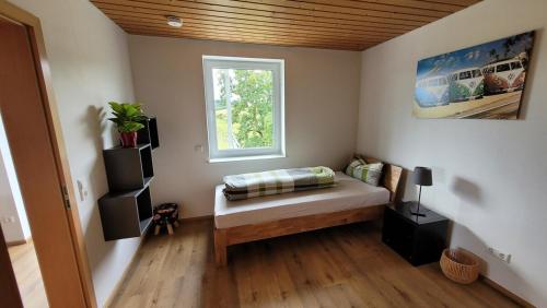 Postel nebo postele na pokoji v ubytování FeWo Weitblick