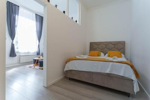Ένα ή περισσότερα κρεβάτια σε δωμάτιο στο Boem residence Skadarlija PARKING