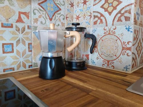a blender sitting on top of a counter at Ferienwohnungen Villa Winkler in Velden am Wörthersee