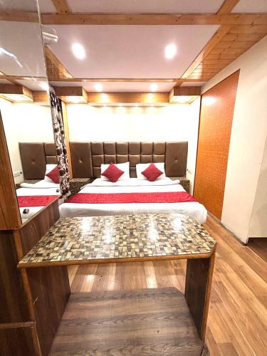 a bedroom with a bed in a room at Lords Grey near Mall Road in Shimla