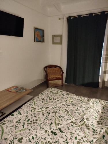 Cama o camas de una habitación en Chez Rodolphe