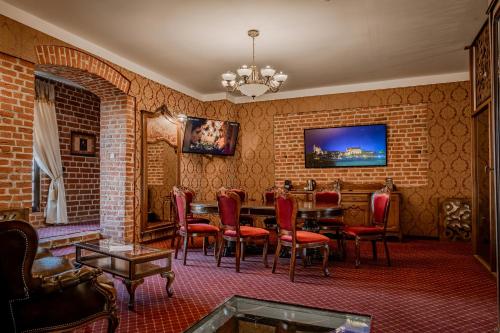 TV a/nebo společenská místnost v ubytování Hotel Zamek Gniew