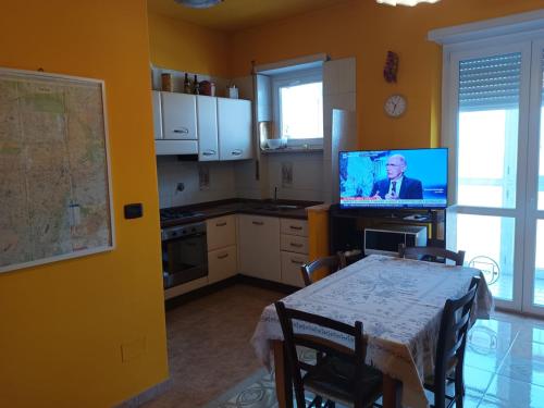 Kuchyň nebo kuchyňský kout v ubytování Comfortable apartment in Torino Mirafiori