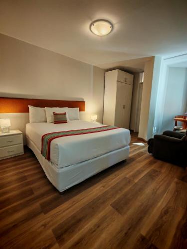 Una cama o camas en una habitación de Hotel Serra Nova