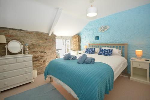 Ένα ή περισσότερα κρεβάτια σε δωμάτιο στο Petroc