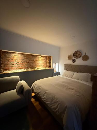Ένα ή περισσότερα κρεβάτια σε δωμάτιο στο Loft Punta Arenas 1