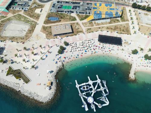 an aerial view of a pirate island in the water at Seaside Apartments, Znjan Beach in Split