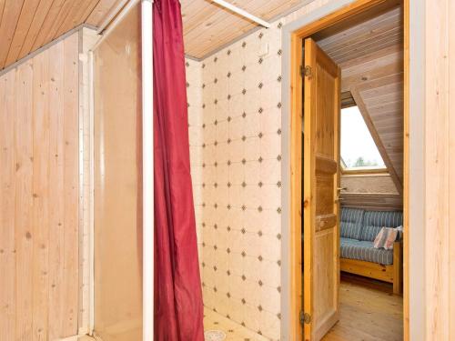 an open door of a room with a couch in it at Luxury Retreat with Pool - By Traum Ferienwohnungen in Toftum