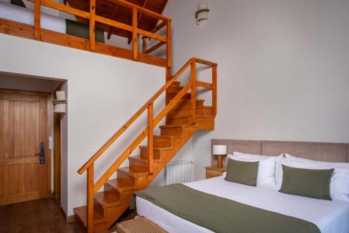 Postel nebo postele na pokoji v ubytování Puerto Manzano Boutique Hotel