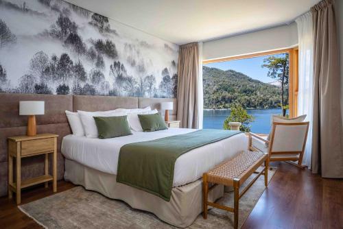 Postel nebo postele na pokoji v ubytování Puerto Manzano Boutique Hotel