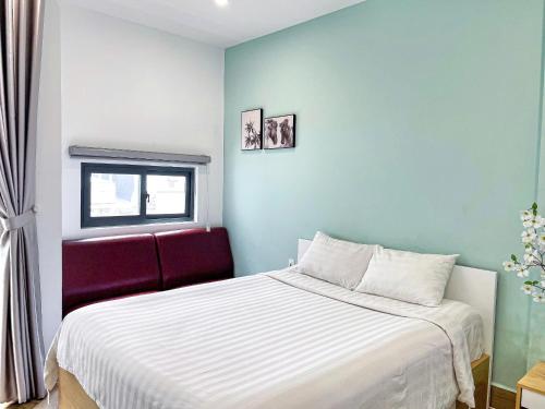 Una cama o camas en una habitación de MIDMOST C22 Apartment