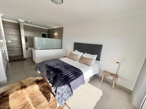 Ένα ή περισσότερα κρεβάτια σε δωμάτιο στο Atlantic Dunes No 14