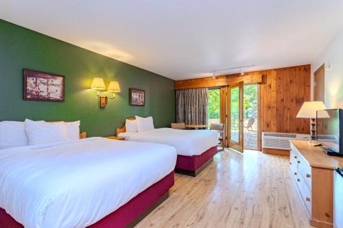 Katil atau katil-katil dalam bilik di Holiday Acres Resort
